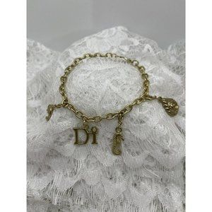 Di Gold Tone Charm Bracelet w/ 4 Charms